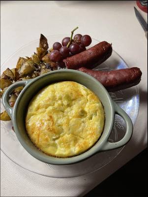 Breakfast Entrees at Door County Scotland Yard - Breakfast entrees are made daily using fresh local ingredients and customized according to dietary needs for guests who may require low carbohydrate, vegetarian, gluten-free, dairy-free or vegan options. Guests make their own tea/coffee in their room. Breakfast is served outdoors (May thru October) unless weather determines need for indoor seating. Breakfast includes Door County Tart Cherry Juice, fresh fruit topped with yogurt and Scotland Yard granola and then followed by a main entree. Main entrees can include Oatmeal waffles with fresh strawberries, Crustless Green Chili Cheese Quiche, Baked Egg Cakes with vegetables, Oatmeal with all the toppings you can imagine, Blueberry Pancakes, Herb Roasted Scotland Yard Potatoes, Scotland Yard Breakfast Sandwiches and more! plant based options for vegan or dairy free guests Breakfast Entrees at Door County Scotland Yard - Breakfast entrees are made daily using fresh local ingredients and customized according to dietary needs for guests who may require low carbohydrate, vegetarian, gluten-free, dairy-free or vegan options. Guests make their own tea/coffee in their room. Breakfast is served outdoors (May thru October) unless weather determines need for indoor seating. Breakfast includes Door County Tart Cherry Juice, fresh fruit topped with yogurt and Scotland Yard granola and then followed by a main entree. Main entrees can include Oatmeal waffles with fresh strawberries, Crustless Green Chili Cheese Quiche, Baked Egg Cakes with vegetables, Oatmeal with all the toppings you can imagine, Blueberry Pancakes, Herb Roasted Scotland Yard Potatoes, Scotland Yard Breakfast Sandwiches and more! plant based options for vegan or dairy free guests