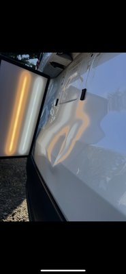 Dent on tailgate door. - Paintless Dent Repair Before & after on a Toyota Highlander.
Deep dent on the tailgate — fully restored with no paint, no filler.
Save your money and time — go PDR!