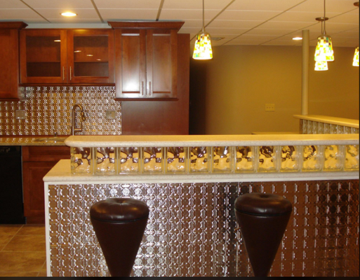 Basement renovation with bar - This remodel was a totally unused basement space. The owners had specific needs for the large, unfinished basement. Cc Designs created a living room, kitchen, dining area, kids nook, sewing room and a complete theatre room. Basement renovation with bar - This remodel was a totally unused basement space. The owners had specific needs for the large, unfinished basement. Cc Designs created a living room, kitchen, dining area, kids nook, sewing room and a complete theatre room.