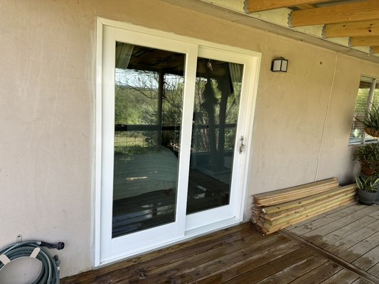 Replacement of old aluminum sliding door with Fiberglass slider - This customer needed to replace their old aluminum sliding door with something more energy efficient. We carefully removed the existing sliding door from the stucco wall and installed a new fiberglass glass slider. Replacement of old aluminum sliding door with Fiberglass slider - This customer needed to replace their old aluminum sliding door with something more energy efficient. We carefully removed the existing sliding door from the stucco wall and installed a new fiberglass glass slider.