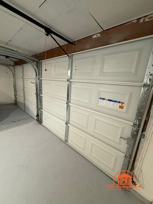 New 2 Single Car Garage System with Installation - We replaced two old garage doors and upgraded the openers to be smart openers. New garage doors, openers, springs, and keypads were installed. New 2 Single Car Garage System with Installation - We replaced two old garage doors and upgraded the openers to be smart openers. New garage doors, openers, springs, and keypads were installed.