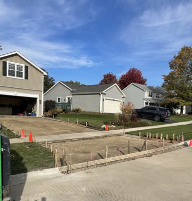 Winfield concrete driveway - Removed damage, asphalt driveway and replace with a new concrete driveway.