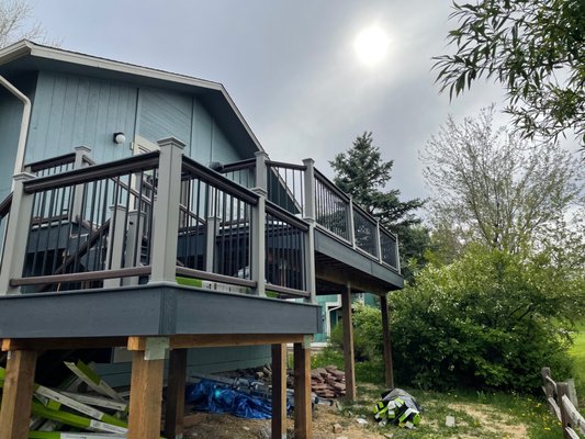 Composite Deck - This is a deck build we did in the spring of 2021 in Boulder, CO. We worked with an architect to come up with the color scheme and general shape/design of the deck. As you can see in the photos we decided to break up the deck into smaller portions to not have butt joints between deck boards which would all open up and show differently overtime, making the deck look of poor quality. The deck frame construction was built entirely from pressure treated LVLs - providing the flattest most stable deck possible.
We recently checked in with the homeowner and they said it is holding up great. Composite Deck - This is a deck build we did in the spring of 2021 in Boulder, CO. We worked with an architect to come up with the color scheme and general shape/design of the deck. As you can see in the photos we decided to break up the deck into smaller portions to not have butt joints between deck boards which would all open up and show differently overtime, making the deck look of poor quality. The deck frame construction was built entirely from pressure treated LVLs - providing the flattest most stable deck possible.
We recently checked in with the homeowner and they said it is holding up great.