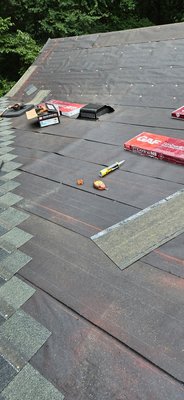 Tear off and replace - New roof and added a couple vents for better ventilation.