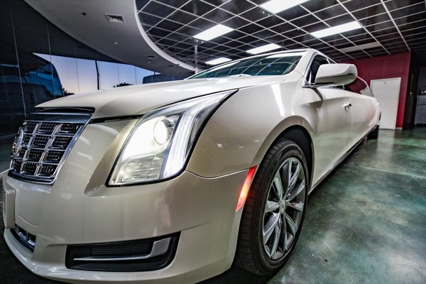 CADILLAC XTS 5TH DOOR STRETCH LIMO - Embark on a journey in this sleek and stylish limousine. With its striking design, spacious interior, and an additional 5th door for easy access, the Cadillac XTS ensures a ride that combines comfort and class. Immerse yourself in an atmosphere of elegance as you experience the smooth ride, state-of-the-art amenities, and unparalleled service that Mirage Limo is renowned for. Elevate any occasion, whether it's a special event, corporate function, or a night out on the town, with the unparalleled luxury of the Cadillac XTS 5th Door Stretch Limo – where every moment becomes a memorable celebration.