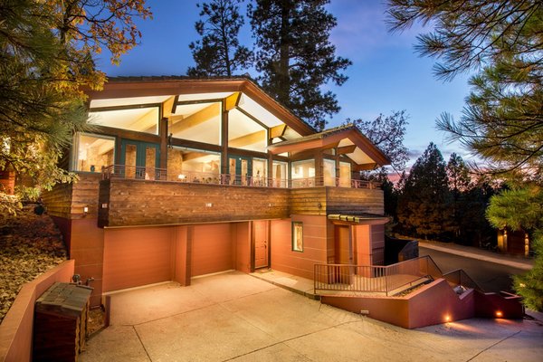 SOLD - Designed by Architect Arnold Roy, Senior Fellow and apprentice to Frank Lloyd Wright - Represented Seller. This beautiful home was designed by Architect Arnold Roy, Senior Fellow and personal apprentice to Frank Lloyd Wright. As one would expect with such distinguished pedigree, this house is not just a home. It is a work of art. True to the Frank Lloyd Wright style, the home has an organic feel that embraces the hillside lot and incredible Peaks Views. The home's exterior exudes a mid century modern flair. Walk inside and you are treated to the types of angles and finishes for which Frank Lloyd Wright is famous. Soaring ceilings, wood beams, and a rock fireplace that serves as the home's centerpiece welcome you into the home's main living area. Large windows bring natural light in and capture the view SOLD - Designed by Architect Arnold Roy, Senior Fellow and apprentice to Frank Lloyd Wright - Represented Seller. This beautiful home was designed by Architect Arnold Roy, Senior Fellow and personal apprentice to Frank Lloyd Wright. As one would expect with such distinguished pedigree, this house is not just a home. It is a work of art. True to the Frank Lloyd Wright style, the home has an organic feel that embraces the hillside lot and incredible Peaks Views. The home's exterior exudes a mid century modern flair. Walk inside and you are treated to the types of angles and finishes for which Frank Lloyd Wright is famous. Soaring ceilings, wood beams, and a rock fireplace that serves as the home's centerpiece welcome you into the home's main living area. Large windows bring natural light in and capture the view