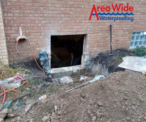 Egress window installation/replacement with window well and cover - Customer contacted us because his basement window was not to code for an egress window. We installed a larger escape window, a new white window well, and a cover to prevent animals from entering. The drain at the bottom was also installed and tied into the sump pump system to keep water from entering the basement through the window. Egress window installation/replacement with window well and cover - Customer contacted us because his basement window was not to code for an egress window. We installed a larger escape window, a new white window well, and a cover to prevent animals from entering. The drain at the bottom was also installed and tied into the sump pump system to keep water from entering the basement through the window.