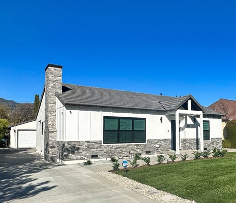 DESIGN BUILD Modern Farmhouse - Arcadia - Experience the timeless appeal of this stunning modern farmhouse remodel, where the seamless combination of white board and batten siding, stone accents, and bold black detailing creates a captivating play of textures and contrasts on the property's exterior.
Step inside this remarkable modern farmhouse transformation, where 852 sq. ft. of additional space, including a thoughtful redesign and remodeling, has beautifully expanded and reimagined the living space.
A new detached garage with storage space with a total of 588 sq. ft. was added, so there is now room for everything from workout equipment to bikes.
We included some before photos that give you a glimpse of the design and construction team's incredible changes to this property. DESIGN BUILD Modern Farmhouse - Arcadia - Experience the timeless appeal of this stunning modern farmhouse remodel, where the seamless combination of white board and batten siding, stone accents, and bold black detailing creates a captivating play of textures and contrasts on the property's exterior.
Step inside this remarkable modern farmhouse transformation, where 852 sq. ft. of additional space, including a thoughtful redesign and remodeling, has beautifully expanded and reimagined the living space.
A new detached garage with storage space with a total of 588 sq. ft. was added, so there is now room for everything from workout equipment to bikes.
We included some before photos that give you a glimpse of the design and construction team's incredible changes to this property.
