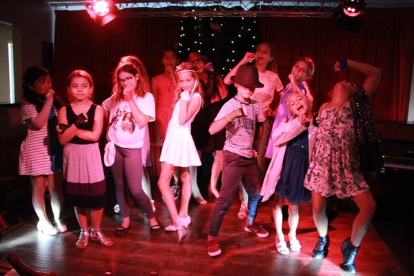 Pop Star Camp - Our annual Pop Star Camp, for ages 8 to 13, runs for a week each summer at our Costa Mesa location. Students learn the art of pop vocal performance, including singing, mic technique, and presentation. Pop Star Camp, 2022, will take place the first week of August.