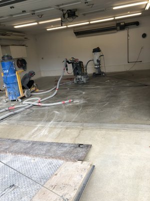 Garage Coating - An older garage with drain had cracks and delaminating concrete. Surface was grinded removing any loose objects and coated with a 3 coat system. Prime, Base with flake and Top coat. Garage Coating - An older garage with drain had cracks and delaminating concrete. Surface was grinded removing any loose objects and coated with a 3 coat system. Prime, Base with flake and Top coat.