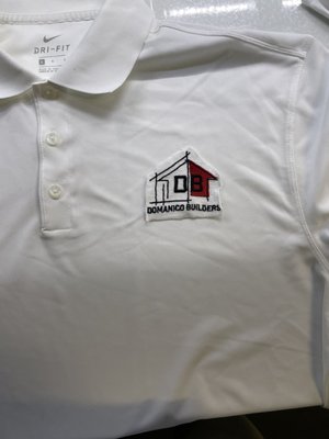 Custom Polos and Hats for Domanico Builders - This project consisted of jackets, hats, and polos. Now the entire team at Domanico Builders is ready to represent their company in high-quality custom merchandise. Custom Polos and Hats for Domanico Builders - This project consisted of jackets, hats, and polos. Now the entire team at Domanico Builders is ready to represent their company in high-quality custom merchandise.