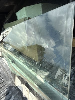 Passenger front window replaced due to laminated glass being cracked - Customer stated rock hit mirror and bounced to window causing crack to happen Passenger front window replaced due to laminated glass being cracked - Customer stated rock hit mirror and bounced to window causing crack to happen