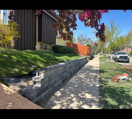 Retaining Wall Client - 4 course with capstone retaining wall. High quality brick from Champion Brick.
Our team provides top-tier landscaping services that elevate your home or business environment. We specialize in design, installation, and maintenance, ensuring your exterior looks stunning and functions perfectly. Call Us to Schedule out!! Retaining Wall Client - 4 course with capstone retaining wall. High quality brick from Champion Brick.
Our team provides top-tier landscaping services that elevate your home or business environment. We specialize in design, installation, and maintenance, ensuring your exterior looks stunning and functions perfectly. Call Us to Schedule out!!