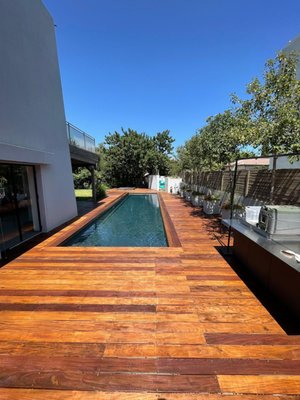 Ipe poolside Deck - Ipe Wood Pool Deck
This custom Ipe wood deck brings natural beauty and durability to a poolside retreat. Built to last, it combines elegance with functionality for the perfect outdoor space. Ipe poolside Deck - Ipe Wood Pool Deck
This custom Ipe wood deck brings natural beauty and durability to a poolside retreat. Built to last, it combines elegance with functionality for the perfect outdoor space.