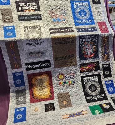 T-Shirt Quilts - Memory Quilts
You supply the Memories, We Create them into Your Finished Quilt. 
We do memory quilts with clothing, baby clothes, photos on fabric, etc. 
Give us an email, text, or use the contact us now to schedule an appointment to discuss your quilt project.