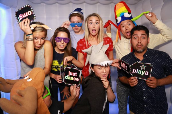 Corporate Events - We are proud to offer an upscale photo booth experience that is perfect for any corporate company party.
From polite booth attendants present the whole time, to quality props and instant printing, you guests will feel taken care of. On the business side, you'll benefit from having the coolest booth around, an inflatable illuminated by LED lights. We create custom, branded photo strips for you, so each printout is as effective as someone bringing home a business card. Corporate Events - We are proud to offer an upscale photo booth experience that is perfect for any corporate company party.
From polite booth attendants present the whole time, to quality props and instant printing, you guests will feel taken care of. On the business side, you'll benefit from having the coolest booth around, an inflatable illuminated by LED lights. We create custom, branded photo strips for you, so each printout is as effective as someone bringing home a business card.