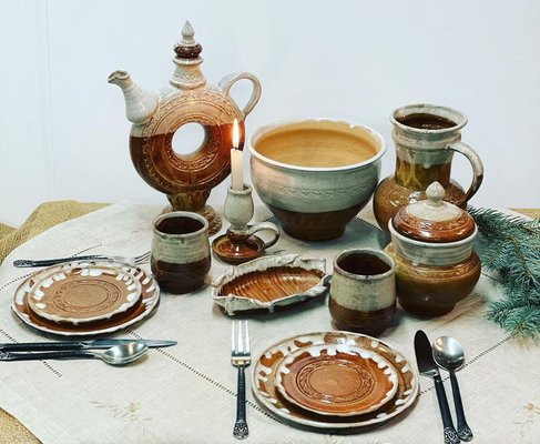 Dining for Two, Pottery - This dining set for two comes complete with plates, mugs, specialty Ukrainian style wine decanter, pitcher, jar, candleholder, tray, and dry food vessel. Made in 2021. Available for purchase.