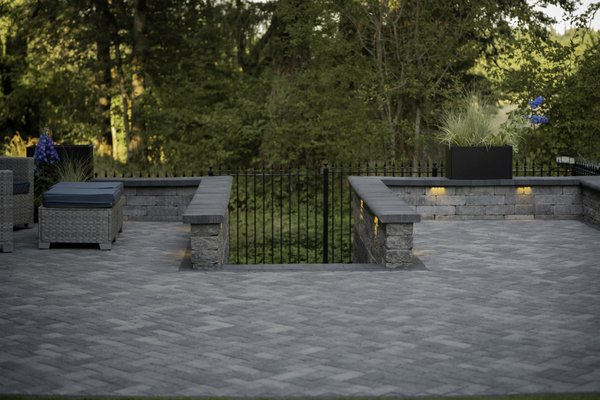 Wilsonville Outdoor Living Upgrade – Retaining Walls, Pavers & Putting Green - This project included a full landscape construction overhaul designed for both beauty and function. Our team at Moxie Construction built custom retaining walls to create structure and usable space in the yard. From there, we installed paver walkways and patios using premium stone to tie the entire outdoor area together and provide smooth, durable surfaces for everyday use and entertaining.
A highlight of the project was the addition of a professional-quality synthetic putting green. This feature was designed with precision grading and drainage to ensure excellent playability while keeping maintenance minimal. It brings both fun and value to the property, making the backyard a space the homeowners can enjoy year-round.
The project also required significant site prep, grading, and integration of drainage solutions to protect the new hardscapes and ensure longevity. With careful planning, high-quality materials, and skilled craftsmanship, we delivered a clean, modern, and durable outdoor living space.
The homeowners wanted a backyard that combined function, recreation, and elegance — and the finished result exceeded their expectations. Wilsonville Outdoor Living Upgrade – Retaining Walls, Pavers & Putting Green - This project included a full landscape construction overhaul designed for both beauty and function. Our team at Moxie Construction built custom retaining walls to create structure and usable space in the yard. From there, we installed paver walkways and patios using premium stone to tie the entire outdoor area together and provide smooth, durable surfaces for everyday use and entertaining.
A highlight of the project was the addition of a professional-quality synthetic putting green. This feature was designed with precision grading and drainage to ensure excellent playability while keeping maintenance minimal. It brings both fun and value to the property, making the backyard a space the homeowners can enjoy year-round.
The project also required significant site prep, grading, and integration of drainage solutions to protect the new hardscapes and ensure longevity. With careful planning, high-quality materials, and skilled craftsmanship, we delivered a clean, modern, and durable outdoor living space.
The homeowners wanted a backyard that combined function, recreation, and elegance — and the finished result exceeded their expectations.