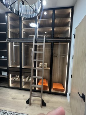 Hidden Springs - Full modern master his and her closets including lighting and made a ladder with same material