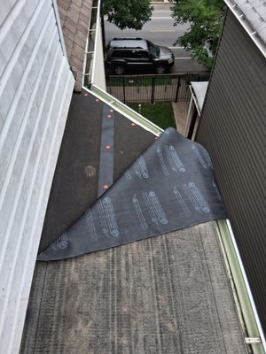Bay window roof replacement chicago illinois removed old shingles and replaced with a new torch down modified roof system - Bay window roof redo , removing old damagishingles at a modified torch down rubber roof system