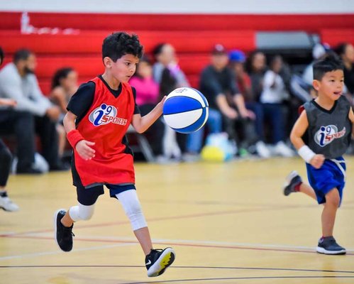 Youth Basketball Leagues - At i9 Sports, our core goals for kids on our basketball teams involve them having fun, loving the sport, and learning great sportsmanship.

In order to achieve those goals, we build basketball teams for our youth basketball leagues in a few ways. When there’s a group of kids who have meshed well, we encourage them to come back for following seasons with team registrations. After all, there’s no reason to break up a good thing! For kids who have friends they’d like to play with, we also have the option to request friends to be placed on the same team. And for kids who are looking to make new friends, we can match them to a basketball team.

So whichever way it works, kids are able to have a great basketball team where they can have fun and learn more about the sport!