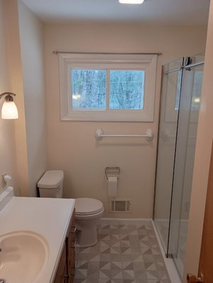 Bathroom remodel - Just freshening up a small bathroom didn't take very long. And didn't cost a whole heck of a lot. Give us a call, maybe we can do this for you too.