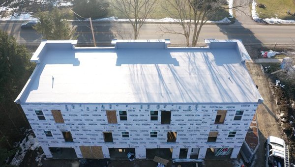 New Construction Roof Installation - This project involved the installation of a brand-new roofing system for a newly constructed building. The scope of work included the installation of a high-performance insulation layer followed by a durable TPO membrane, designed to provide superior weather resistance and energy efficiency. The team ensured precise installation to meet all safety standards and deliver a reliable, long-lasting roof that offers optimal protection against the elements.