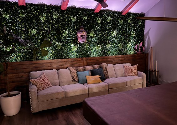 Accent Wall - We recently transformed a custom entertainment room with a stunning accent wall designed to bring life and atmosphere into the space. Featuring a lush, live green look, the wall adds a natural, vibrant backdrop while seamlessly blending with the room’s modern aesthetic. Integrated lighting highlights the texture and depth of the greenery, creating a warm, inviting glow that elevates the entire experience—perfect for movie nights, game days, or just relaxing in style.