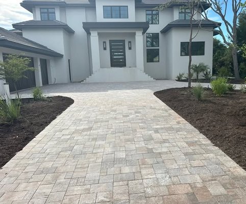 Driveway Installations. - A professionally installed driveway does more than provide a place to park—it enhances curb appeal, improves functionality, and adds lasting value to your property.

At B&C Pavers LLC, we specialize in custom driveway installations designed to complement each home's style while delivering long-term durability. From site preparation and grading to the final installation, our team focuses on quality craftsmanship, proper drainage, and attention to every detail.

Whether using pavers, concrete, or decorative hardscape materials, we work closely with homeowners to create driveways that are both beautiful and built to withstand Florida's climate. Browse our completed projects to see how we transform ordinary entrances into stunning first impressions.

Quality. Reliability. Craftsmanship. That's the B&C Pavers LLC difference.