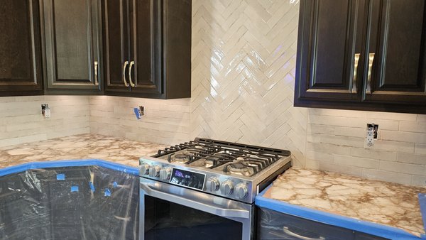 Kitchen backsplash - Our client went from a simple and boring 6" stone splash, to a full piece of art backsplash. with a beautiful but more character subway tile. Kitchen backsplash - Our client went from a simple and boring 6" stone splash, to a full piece of art backsplash. with a beautiful but more character subway tile.