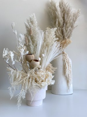 Dried Blooms - Shades of creams with a mixture of pampas, bunny tails, spear palms + other dried floral to give a bohemian look to your home. Dried Blooms - Shades of creams with a mixture of pampas, bunny tails, spear palms + other dried floral to give a bohemian look to your home.