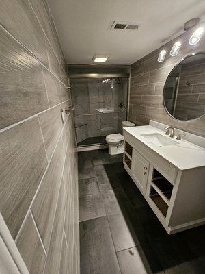 Full bathroom remodel - This was a full bathroom remodel that came out great! Beautiful new shower with glass doors. Tiled all of the walls and the floor in the bathroom! All new accessories as well!