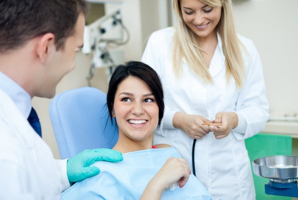 COSMETIC DENTISTRY & ORTHODONTICS - Providing cosmetic solutions to dental problems is something that Dr. Brazdo loves to do for her patients. Redesigning a great smile or facial profile with high-quality dental work improves a patient’s self-confidence. As an added bonus, sometimes a cosmetic dental fix can result in improved dental function.

WHAT IS COSMETIC DENTISTRY

Cosmetic dentistry is generally used to refer to any dental work that improves the appearance of teeth, gums, and/or bite.  It primarily focuses on improvement in dental aesthetics in color, position, shape, size, alignment, and overall smile appearance.

COSMETIC PROCEDURES

Dental Bonding

Dental bonding (also known as cosmetic bonding) is a great alternative for porcelain veneers or crowns and can be  used to fix chipped, cracked, or discolored teeth.  The procedure is very similar to your dentist placing a filling.  The bonding procedure can be completed in a single dental office visit. Since the material used is not as strong as your natural tooth enamel, it is more likely to stain, chip, or break than natural teeth.  Dental bonding typically lasts three to five years before the need for repair or further cosmetic dentistry service.  See our dental bonding page for more information.

Veneers & Crowns

A dental veneer is a thin layer of porcelain placed over a tooth.  A crown is a porcelain cap the encompasses the whole tooth.  Veneers and crowns can improve the aesthetics of a smile and protect the tooth’s surface from damage.  They are virtually undetectable and highly resistant to coffee, tea, or even tobacco stains. Veneers and crowns have the ability to change the shape and look of your teeth.  The procedure will take multiple appointments.  Since we are changing the aesthetics of your front teeth, your first appointment will be to take impressions of your current smile and send it to the lab.  The lab will send back models with the estimated teeth aesthetics in wax.  This will allow your temporaries to be made in the shape of your new teeth.  Your second appointment will be to prepare the teeth for the permanent restorations.  You will leave in you temporaries shaped with your new smile.  Your final appointment, upon approval, will be to permanently cement the porcelain veneer or crown. See our veneers page for more information

Teeth Whitening

If you are happy with the shape of your teeth, you may be a candidate for teeth whitening.  We offer two different types of whitening to achieve your goals.  At your first appointment we will take impressions of your teeth.  We will send these to the lab and you will return a few weeks later to have these whitening trays delivered. Our first option is take home trays. A dental assistant will dispense the trays and gel with instructions on how to whiten at home. Our second option is in-office whitening. This option also includes take home trays that are delivered with a tooth conditioner prior to the in-office session.  You will use this for two weeks to prepare your teeth for the in-office whitening session. The in-office session is approximately 90 minutes. When your session is completed, you will receive gel to use with the trays for at home maintenance. It is important to note, while in the process of whitening your teeth you will need to avoid dark liquids such as coffee, tea, and red wine. It would be beneficial to drink these liquids through a straw during the process.  See our page on teeth whitening for more information.

Orthodontics with Invisalign

Invisalign is an alternative to braces that can be done on a case by case basis by select dentists. If you have a minor misalignment, Dr. Brazdo may be able to help you straighten your smile with Invisalign. These clear aligners gradually move teeth to improve not only the look of your smile but to improve your bite as well. Invisalign uses a series of clear removable aligners to straighten your teeth without metal wires or brackets. The aligners are made through a combination of Dr. Brazdo’s expertise and 3-D computer imaging technology. You wear each set of aligners for about 2 weeks, removing them only to eat, drink, brush, and floss. As you replace each aligner with the next in the series, your teeth will move – little by little, week by week – until they have straightened to the final position Dr. Brazdo has prescribed. More complicated cases will need to be referred to an Orthodontist.  See our page on Invisalign for more information.