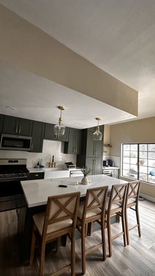 Kitchen and Living Room Remodel - this house was remodeled
all. new plumbing electricity. cabinet insulation. drywall plaster texture. and more. Let me know if you need help with your project.