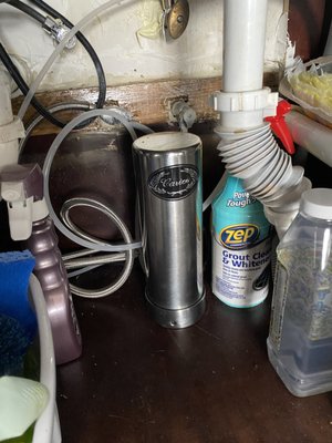 Point of Use Water Purifier/Filter installed in Sunrise, Fl. - The point of use 10" under the counter water filter was installed in a townhouse community in Sunrise, Fl. The customer shopped many water purification companies before hiring Palm Beach Water Purification to get the job done. Her water tested high for chlorine and other harmful metals before the install and now her water 100% purified and contaminate free. Point of Use Water Purifier/Filter installed in Sunrise, Fl. - The point of use 10" under the counter water filter was installed in a townhouse community in Sunrise, Fl. The customer shopped many water purification companies before hiring Palm Beach Water Purification to get the job done. Her water tested high for chlorine and other harmful metals before the install and now her water 100% purified and contaminate free.
