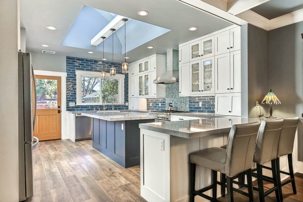 Complete Kitchen Remodel - This remodel was done on a kitchen that was small and dark.  We created a whole new look that was inviting and bright.