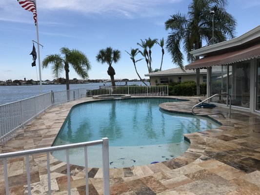Pool Remodel in Palm Harbor - Travertine Pool Deck, Travertine Stairs Leading to Boat Dock, Travertine Coping, Spa Tile