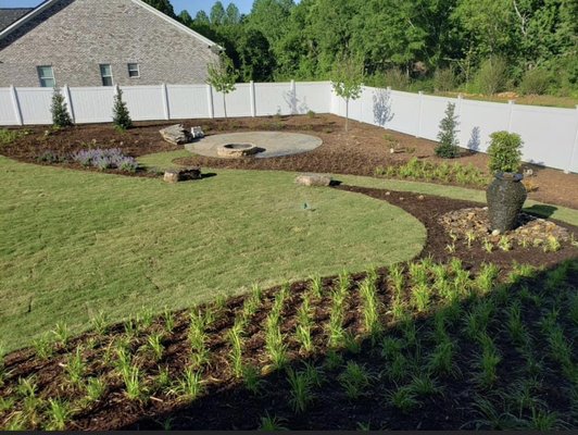Patio, Fire Pit and Fountain - Full Landscape including Water Feature, Flagstone Patio with Fire Pit, Accent Boulders, Irrigation, Sod, Trees and Shrubs Patio, Fire Pit and Fountain - Full Landscape including Water Feature, Flagstone Patio with Fire Pit, Accent Boulders, Irrigation, Sod, Trees and Shrubs