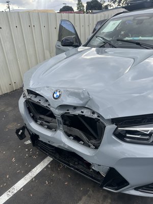 2022 BMW X4 M4, collision repair - Those cars came in really bad shape. Major front-end collision, airbags deployed. Unfortunately, the client's insurance did not cover it, so we had to help her out. But in the end, everything turned out nice - so nice in fact that you could never tell the car was even ever in an accident. We take pride in making sure that all our clients are happy and the work comes out exceptional. 2022 BMW X4 M4, collision repair - Those cars came in really bad shape. Major front-end collision, airbags deployed. Unfortunately, the client's insurance did not cover it, so we had to help her out. But in the end, everything turned out nice - so nice in fact that you could never tell the car was even ever in an accident. We take pride in making sure that all our clients are happy and the work comes out exceptional.