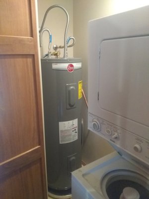 Water Heater Replacement - A customer called with a leaking water heater. He told me he saw our Yelp page and called us - after calling several other plumbers WHO DIDN'T ANSWER THEIR PHONES. After a quick conversation, I traveled to his home - SAME DAY - and sized up the situation. Sure enough, the bottom of his 50 Gallon Electric Tank Water Heater had sprung a leak and was filling the overflow pan. Unfortunately, the water heater was in a smallish supply closet - completely blocked by a stack washer dryer combo -and up two flights of stairs! I immediately turned off the ball valve on the supply line and began draining the tank. While the tank drained, I disconnected the washer dryer combo and moved it into the adjacent living room. I removed the empty old tank and hauled it downstairs - just to turn around and bring the new water heater up. After some quick modifications to the supply lines, I replaced the ball valve, and the supply lines and reconnected the unit. We had hot water coming out of the tap within 20 minutes. I also moved the washer dryer back in place and reconnected it, too! Total Cost - $2100. Total Time - 4.5 Hours