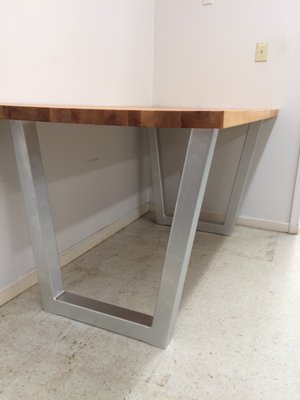 Custom Table - This table was built for a 3D printing room. The table is square tubing legs with butcher block top