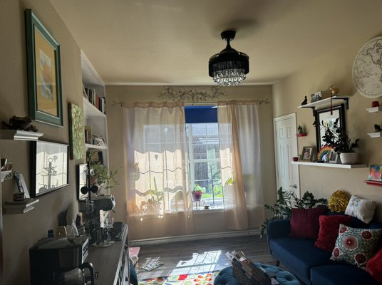 Room repaint and sheetrock repair - This repaint was done in a customer coffee room, it included a sheetrock repair at the bay window. Loved how the accent colors look at the window and shelves.