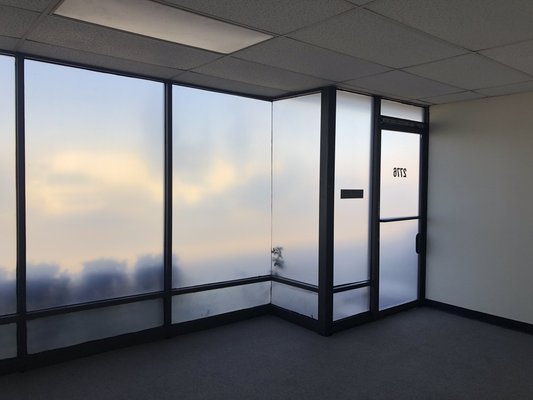 Small Commercial Warehouse - A matte gray film was installed to provide privacy. The goal was to obscure the view into the interior while still allowing light to enter. Small Commercial Warehouse - A matte gray film was installed to provide privacy. The goal was to obscure the view into the interior while still allowing light to enter.