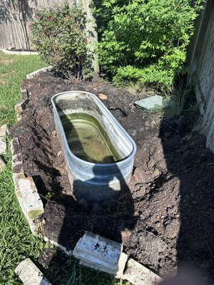 Fountain and trough removal - Removed a 6 foot horse trough that had a water source running to it, and it used filler dirt and black mulch to complete the project and rebuilt the lime stone bricks around it it Fountain and trough removal - Removed a 6 foot horse trough that had a water source running to it, and it used filler dirt and black mulch to complete the project and rebuilt the lime stone bricks around it it