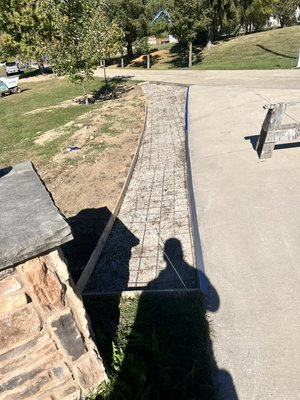 REPLACEMENT AND DRIVEWAY EXTENSION - This renovation was done on a driveway extension that was in poor condition and cracked, highlighting the poor condition of the driveway. We demolished it and installed new concrete. "The owners were delighted with their new driveway."
