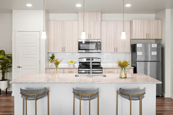Apartment Amenities - Find peace of mind in our stunning one-, two-, or three-bedroom apartments in North Phoenix, complete with thoughtfully curated in-home amenities designed to suit your every need. Our elegant, designer-inspired kitchens feature high-end stainless steel appliances, granite countertops, bronzed nickel fixtures, oversized islands*, pantries*, and much more. 
*Available in select apartment homes.