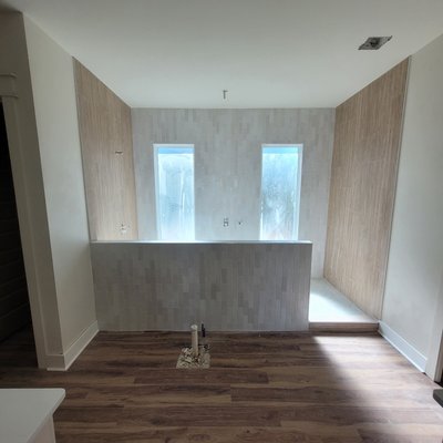 Custom Projects - This album is an update of our various jobs lately. This includes remodels and new homes. Featuring multiple options of flooring including vinyl plank, tile, and split brick. Tile projects such as custom backsplashes and showers. We also offer a solid surface called Durasein used for showers and countertops.