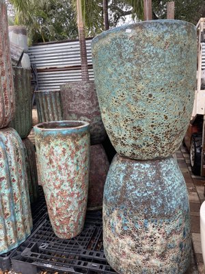 Pottery in the Garden. - The Importance of Pots and Pottery in a Refined Garden

Pots and pottery elevate a refined garden by adding structure, versatility, and artistic appeal. They allow for controlled planting, ensuring optimal soil conditions and mobility for seasonal adjustments. Strategically placed, they create focal points, enhance symmetry, and introduce varying heights for visual interest. Elegant pottery complements the garden’s aesthetic, harmonizing with its design while showcasing plants in a sophisticated, curated manner.