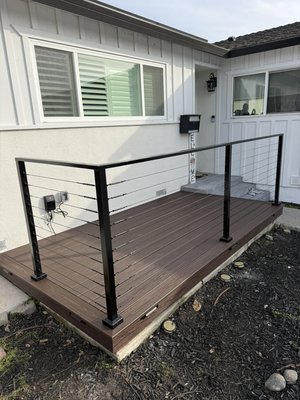 Front Porch with Railing - This was a porch using Trex Composite and cable railing. A modern look to the home. Front Porch with Railing - This was a porch using Trex Composite and cable railing. A modern look to the home.