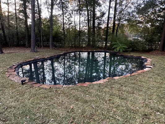 Installing an ornamental water feature where a low spot once existed. - This project was a long time coming, an area that collected rain water runoff, it has been a garden area once, that flooded, it was the ideal location for the termination of a french drain to discharge water and an area that stayed wet and soggy most of the time…it just made sense to turn into something beautiful to sit around and enjoy. Water plants (Water Lily and Lotus) and fish to be added soon! Installing an ornamental water feature where a low spot once existed. - This project was a long time coming, an area that collected rain water runoff, it has been a garden area once, that flooded, it was the ideal location for the termination of a french drain to discharge water and an area that stayed wet and soggy most of the time…it just made sense to turn into something beautiful to sit around and enjoy. Water plants (Water Lily and Lotus) and fish to be added soon!